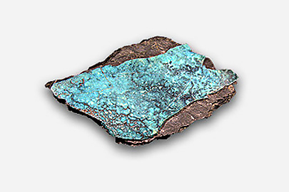 A dark grey rock with a streak of turquoise on top.