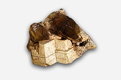 A fragment of feldspar which is gold in colour.