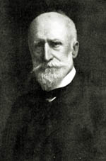 Alfred Hewitt Black and white photo of Alfred Howitt wearing a suit and neat white beard