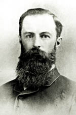 Reginald Murray Black and white photo of Reginald Murray wearing a suit and a long, dark beard