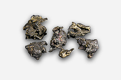 Small pieces of smelted silver.